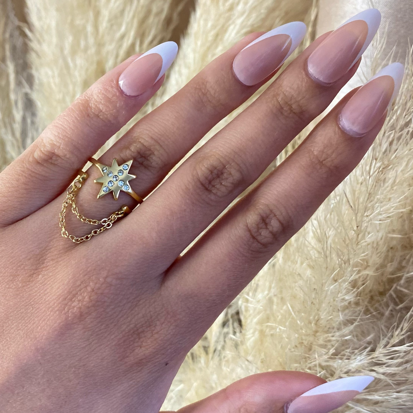 Bague étoile strass et chaînettes en acier inoxydable pour femme