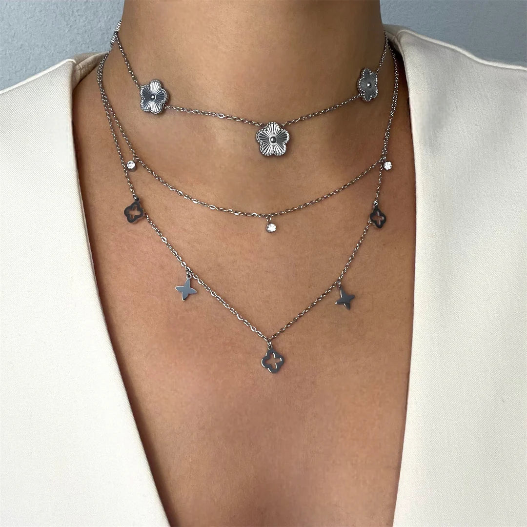Collier deux rangs trèfles et étoiles en acier argenté pour femme