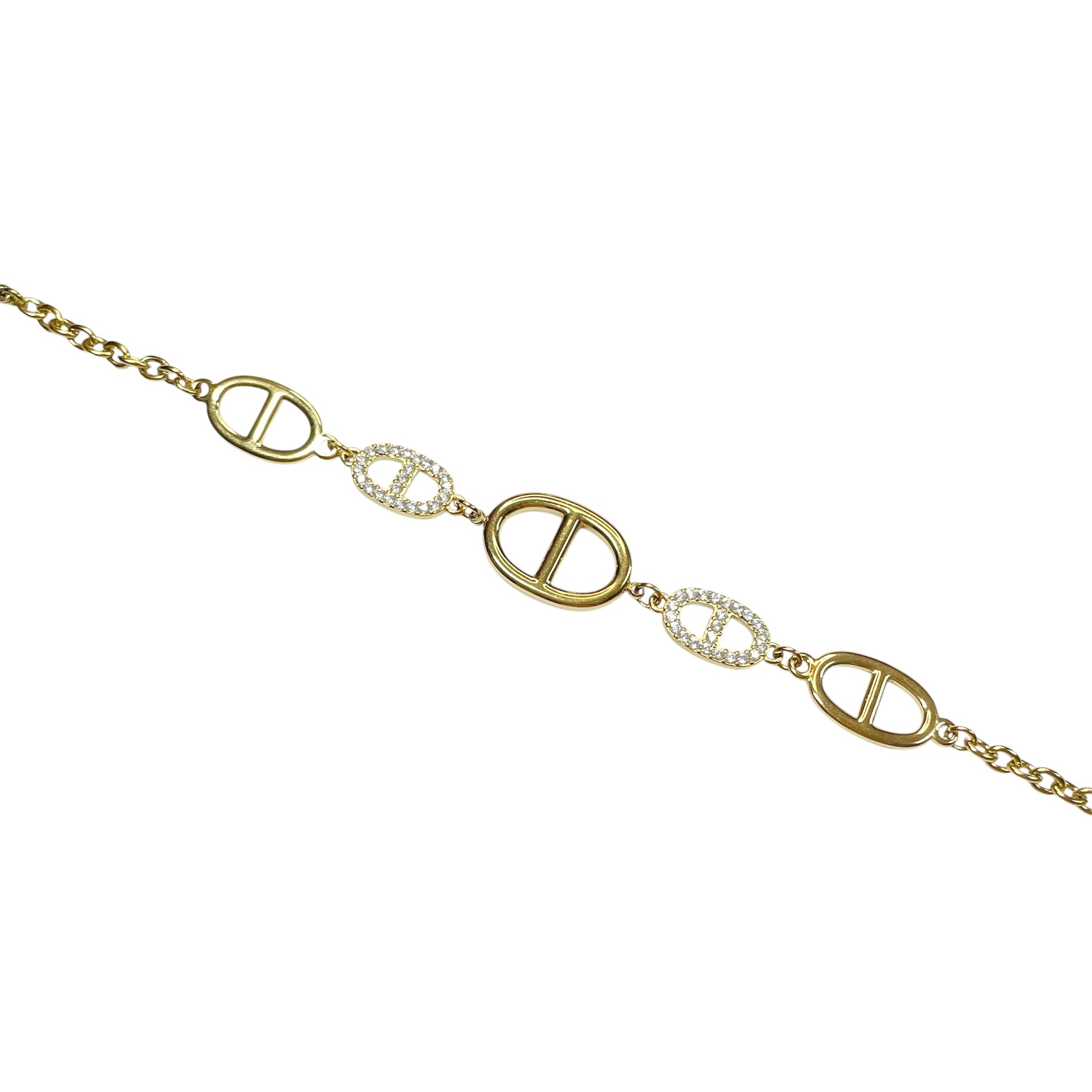 Bracelet maille marine avec strass scintillants  en acier inoxydable doré, bijou élégant et raffiné pour femme.