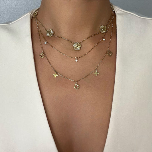 Collier deux rangs trèfles et étoiles en acier doré pour femme